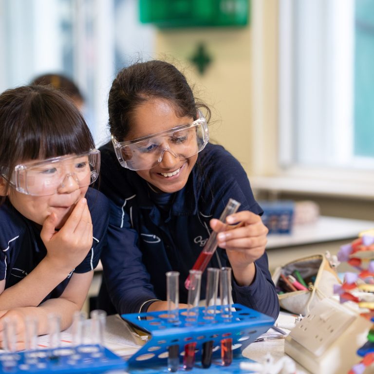 Queen's Gate Junior School girls in Chemistry lesson