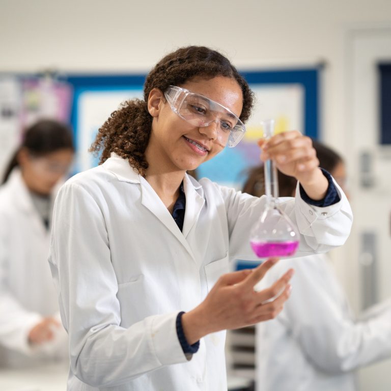 Queen's Gate Senior girl in chemistry lab