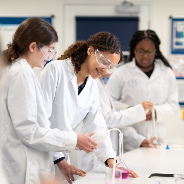 Queen's Gate Senior girl in chemistry lab