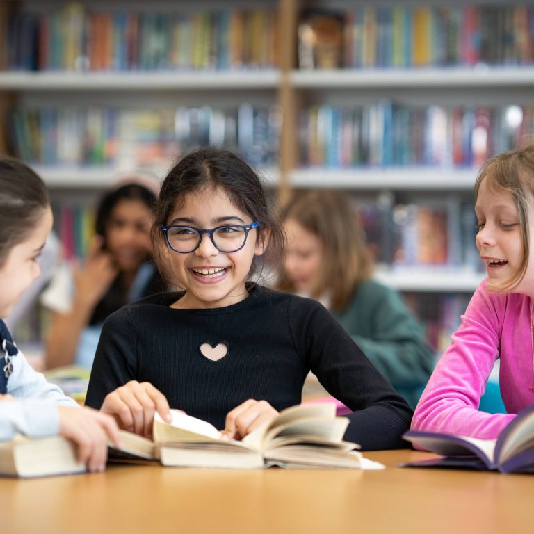 Queen's Gate Junior School girls in the library