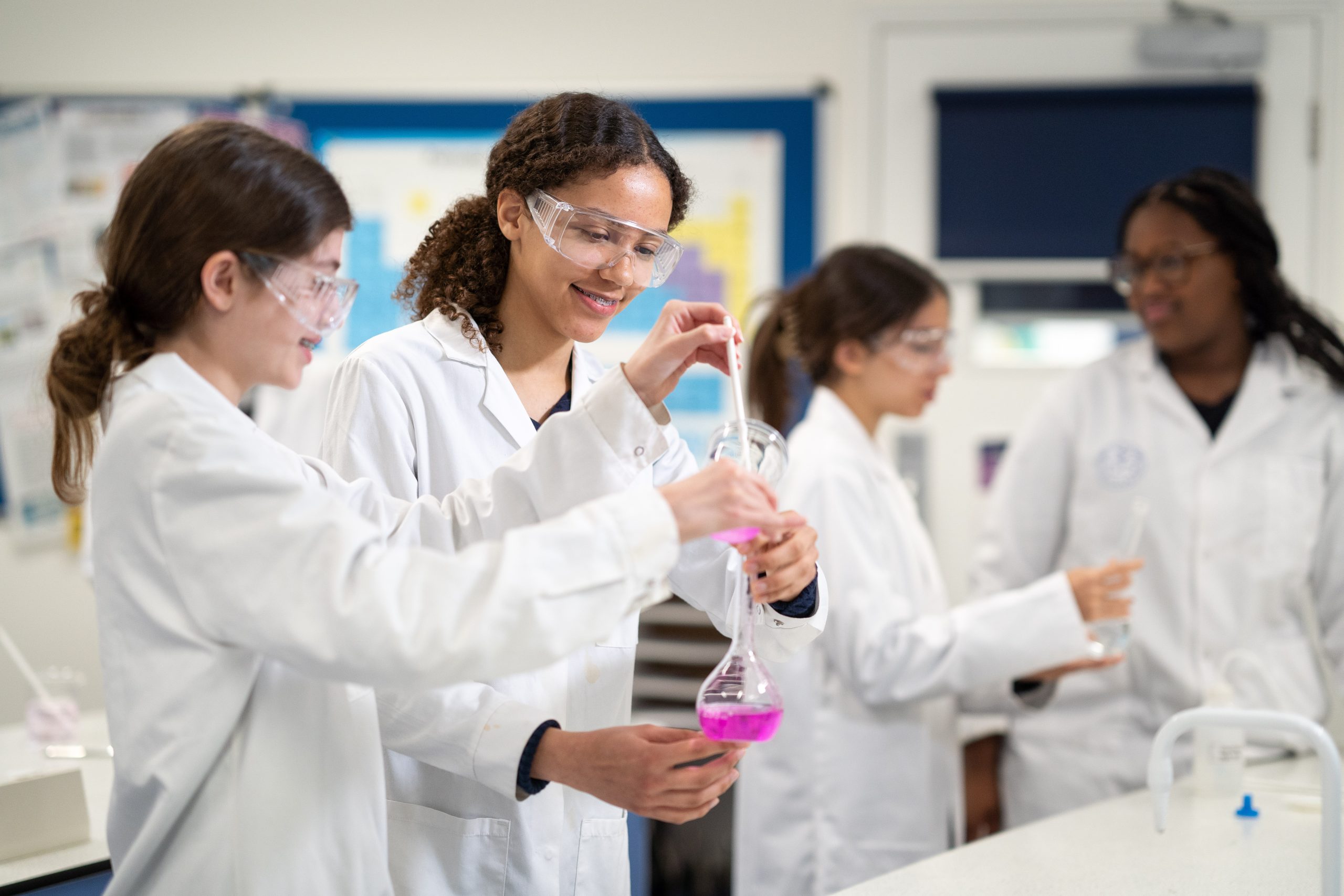 Quen's Gate Senior School girls in science lab